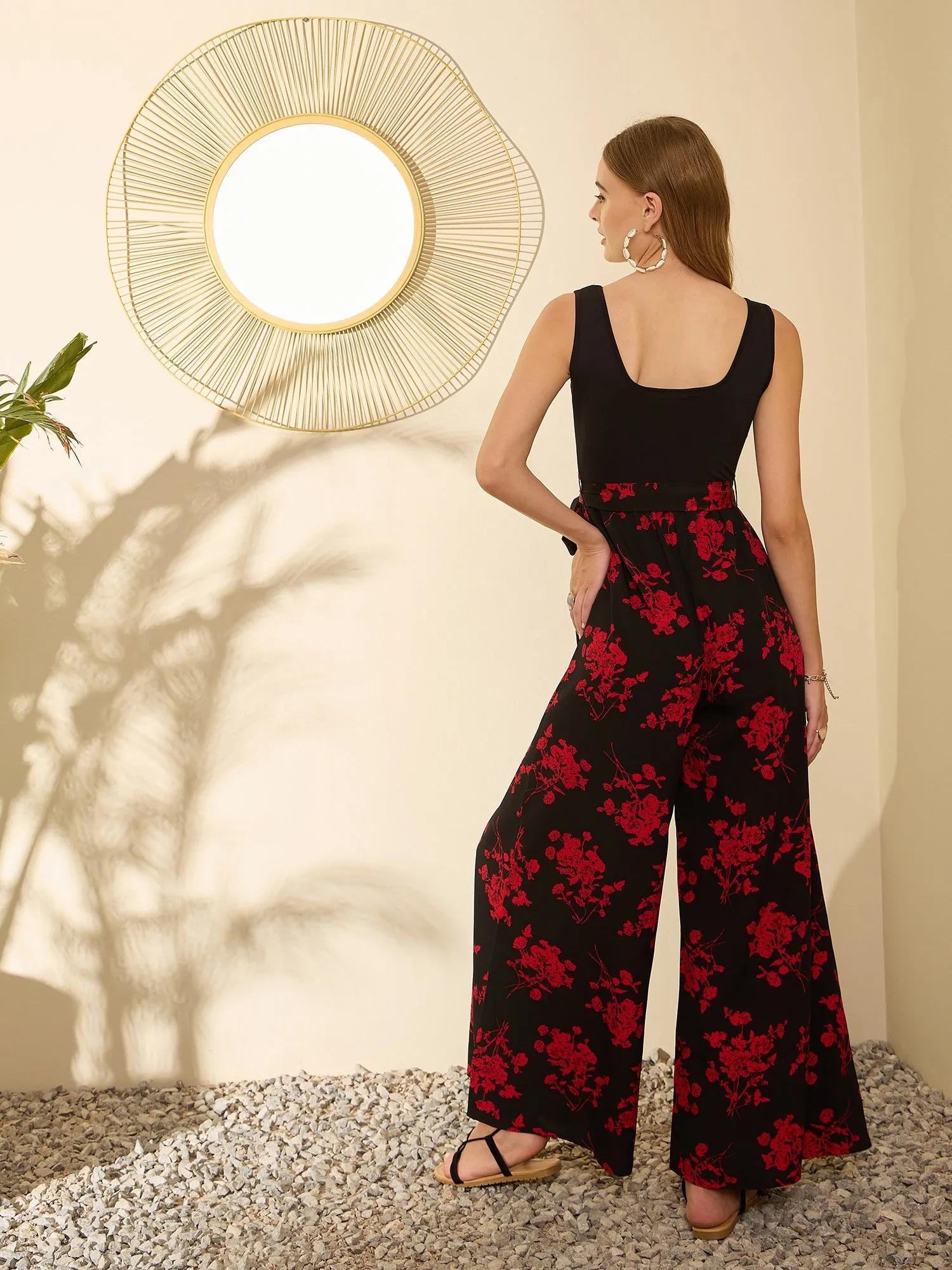 Berrylush Women Black & Red Floral Printed Scoop Neck Sleeveless Tie-Up Waist Flared Maxi Culotte Jumpsuit